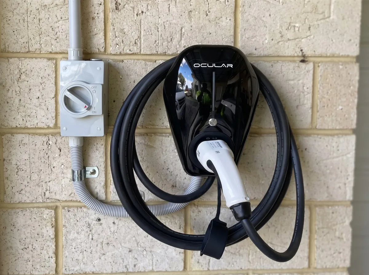 Ocular IQ Home EV charger mounted on a wall